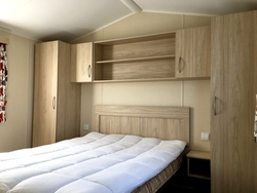 [Holiday caravan, Norfolk, bedroom.]