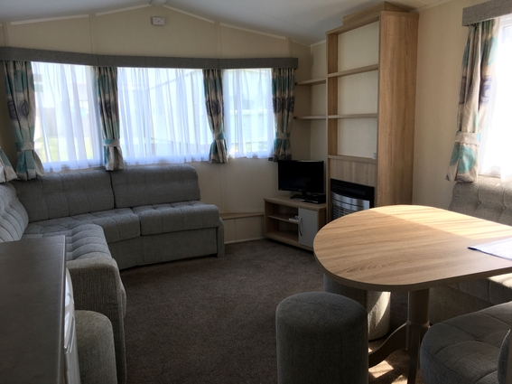 Photo of a living room in one of our holiday caravans